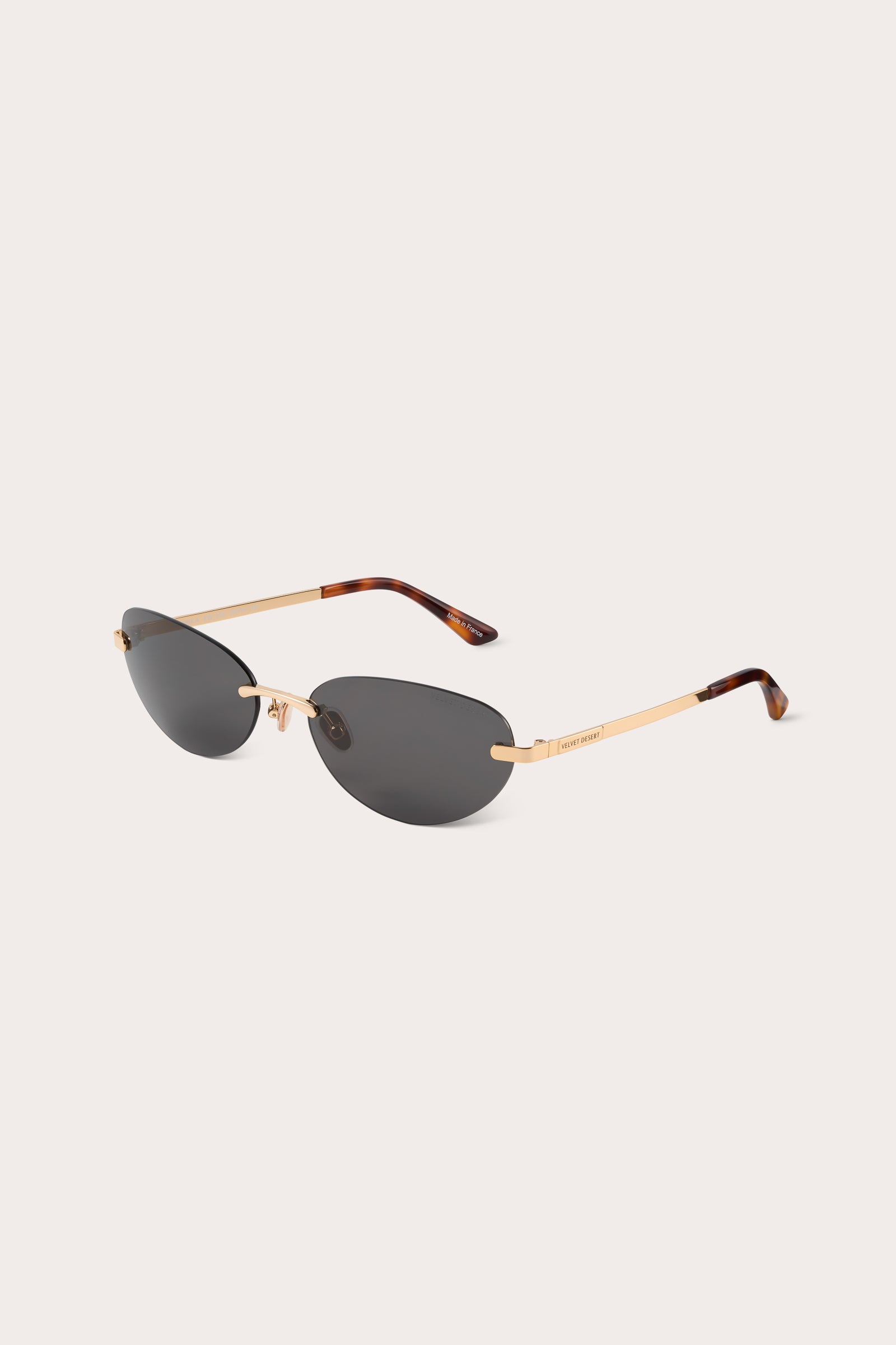 RIMLESS METAL SUNGLASSES BLACK LENSES